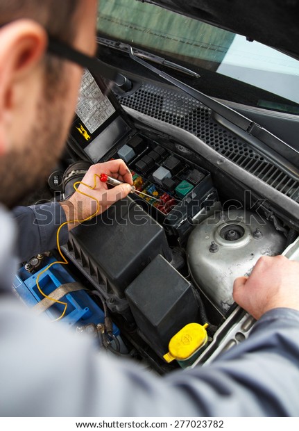 Car electric repair,  Repair of electrical wiring in the
car. 