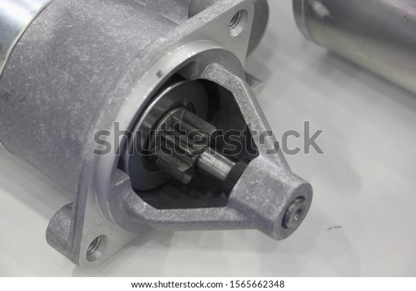 Car electrical starter with\
closed body close up, overrunning starter clutch with sliced\
pinion