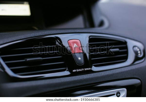 Car emergency lights\
button close up.