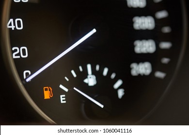 Car with empty gas tank close-up on modern dashboard - Powered by Shutterstock