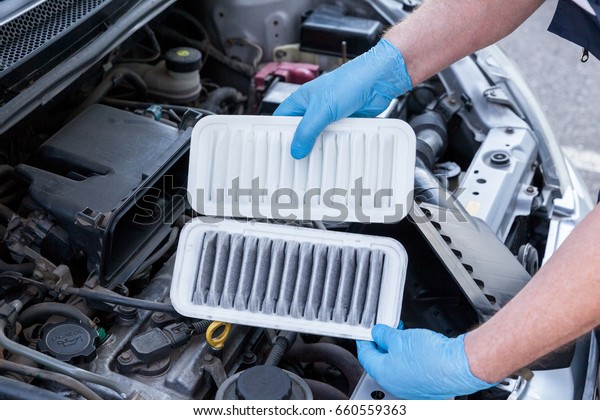 Car engine air\
filters, dirty and clean