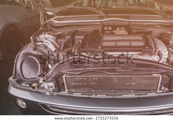 Car engine close-up. Internal
combustion engine, car parts, deteyling. Parsing
jankyard
