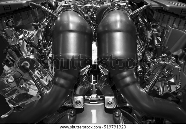 Car engine,\
concept of modern automobile motor with metal, chrome, plastic\
parts, heavy industry,\
monochrome