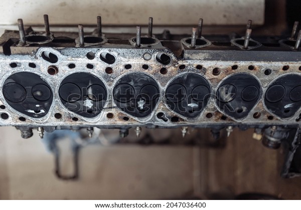 car engine cylinder head\
repair.