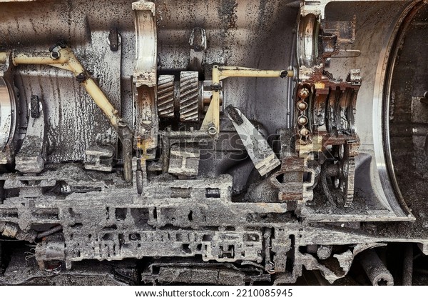 Car engine and gearbox cross section cut in half\
to display engineering\
details