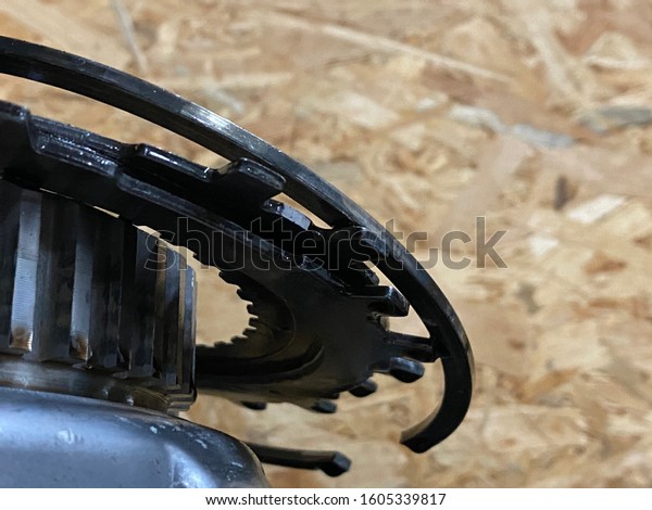 car\
engine metal gearbox parts closeup in small workshop\
