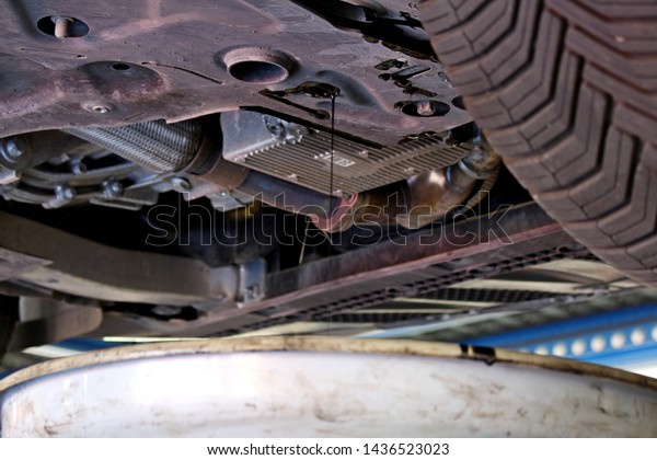 car engine oil\
change in mechanical\
workshop
