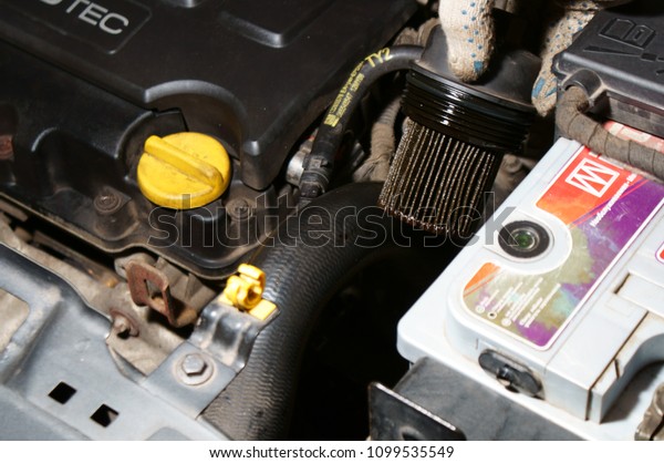 Car engine oil filter\
replacement