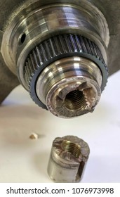 The car engine part broken in half. Crankshaft