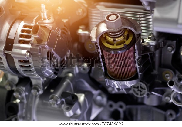 Car engine part, concept of modern\
vehicle motor and cut metal car engine part\
details