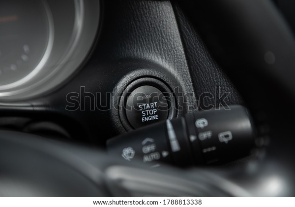 Car engine push start stop button ignition\
remote starter. Car\
dashboard