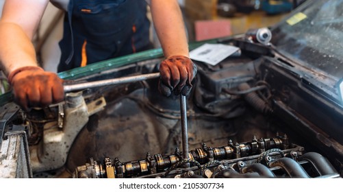 Car Engine Repair, Camshaft Valve Adjustment.