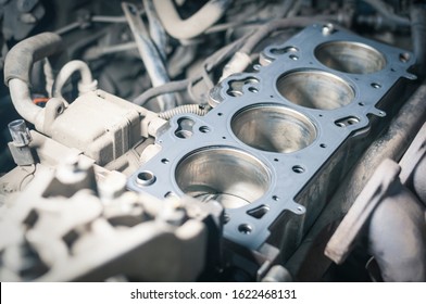 Car Engine Repair. Cylinder Head Gasket Replacement In Workshop