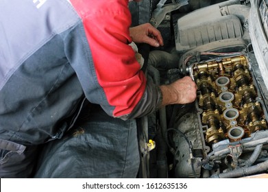 Car Engine Repair In The Service Center. Removing And Installing The Heat Exchanger. Replacement Of Seals, Replacement Of Camshaft Seals. Replacing The Valve Cover Gasket.