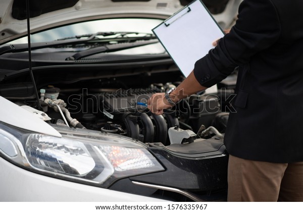 Car and engine service concept -
Blurred car engine room checking maintenance service by mechanical
and copy space, Use for car engine service
content