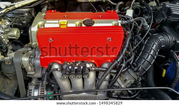 Car engine service concept - Close up new car\
engine room on checking engine maintenance service in car service\
center and copy space