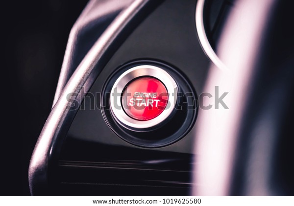 Car engine start\
button, selective focus