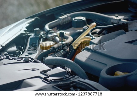 Car engine under the hood Renault Megane
