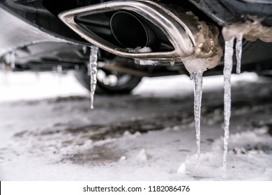 Car Exhaust Pipe Details With Icicles, Winter Season