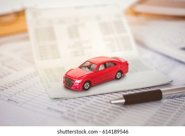 Car Expenses Calculator, Payments  Costs With Paper Notes, Payments Table,dollar Money And Toy Car. Financial And Installment Payment Concept.