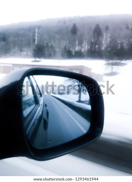 Car exterior rearview mirror with the view of the\
rear street