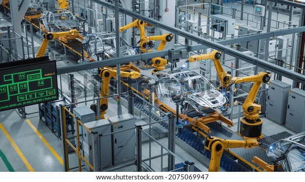 Car Factory 3D Concept: Automated Robot Arm Assembly\
Line Manufacturing High-Tech Green Energy Electric Vehicles.\
Construction, Building, Welding Industrial Production Conveyor.\
Elevated Wide Shot