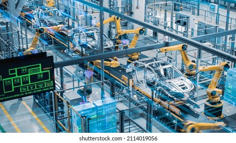 Car Factory Digitalization Industry 4.0 5G IOT Concept: Automated Robot Arm Assembly Line Manufacturing High-Tech Electric Vehicles. AI Computer Vision Analyzing, Scanning Production Efficiency - Shutterstock ID 2114019056