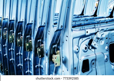 A Car Factory; Neatly Arranged Exterior Components Of A Car