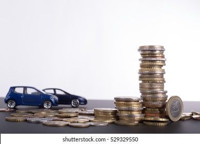 Car finance money stack with white background.