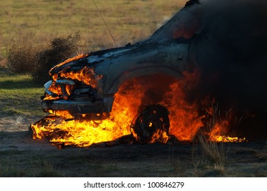 Car Fire On Desert Rural Road