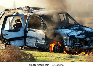 Car Fire On Desert Rural Road