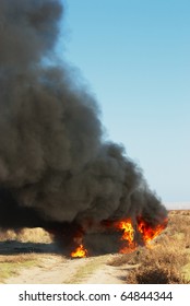 Car Fire On Desert Rural Road