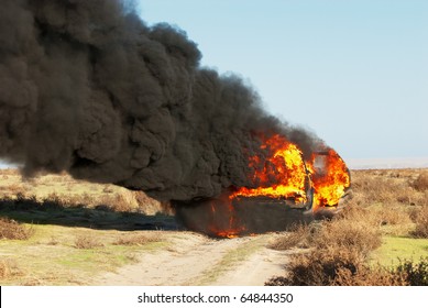 Car Fire On Desert Rural Road