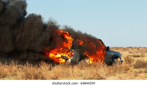 Car Fire On Desert Rural Road