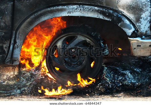 Car fire on desert rural\
road