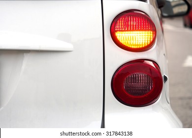 Car. Flashing turn signal indicating the right direction.   
