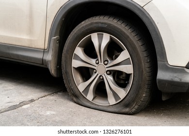 Car Flat Tire Tire Leak On Stock Photo 1326276101 | Shutterstock