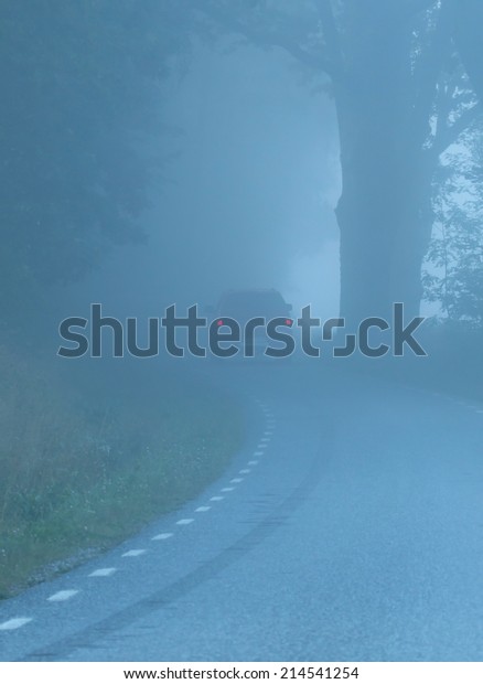 Car in fog