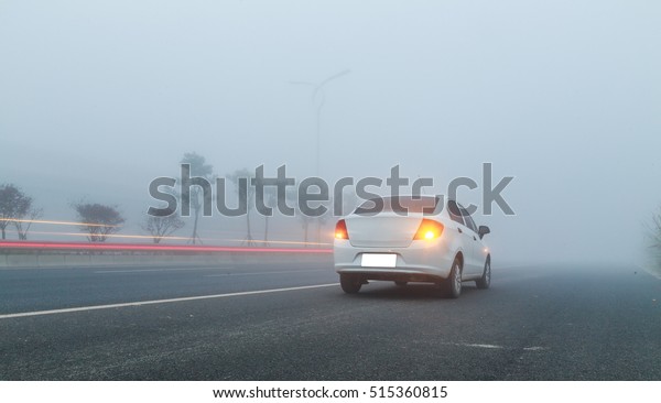 car in the
fog