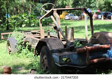 Car Frame And Old Car Engine Located In The Protected Forest Tourism Park 