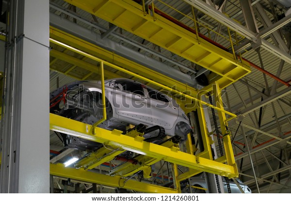 Car frame with unfinished assembly\
in the production line of the automobile\
enterprise