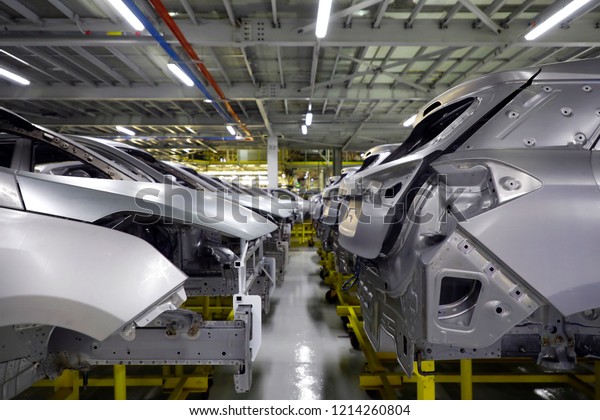 Car frame with unfinished assembly\
in the production line of the automobile\
enterprise