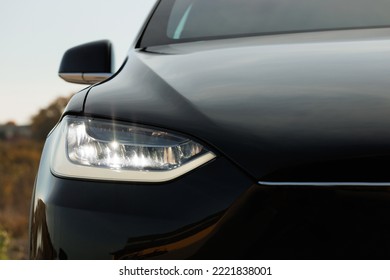 Car Front Full Led Matrice Light. Modern adaptive car headlamp flashing light with blinking on continuously indicator. Switched on led lights of luxury car. Car Blinker Light.
