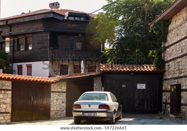 The car in front of the gates of a\
house in Old Nessebar, Bulgaria, September 1,\
2013.