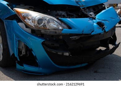 Car Front Hood And Headlight Damaged After Accident. Dangerous, Careless, Unsafe, Drunk, Impaired  Driving, DUI, Car Crash Fatal Injury, Insurance Claim Concept.