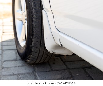Car front tyre mud guard - Shutterstock ID 2245428067
