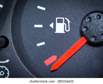 Car Fuel Gauge Showing Empty, Close Up