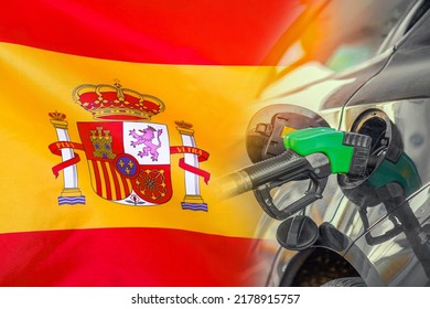Car with a fuel injector on Spain flag background. Record prices fuel for population. Gasoline price increase during energy and fuel world crisis in Spain