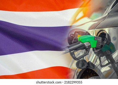 Car With A Fuel Injector On Thailand Flag Background. Record Prices Fuel For Population. Gasoline Price Increase During Energy And Fuel World Crisis In Thailand