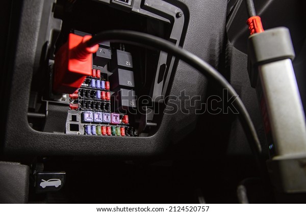 Car fuse block with a connector for computer\
diagnostics of car systems
